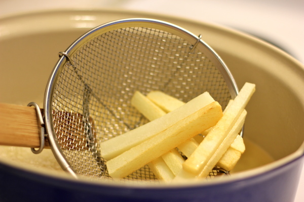 Buffalo Ranch Fries - Homemade french fries made to crisp perfection, topped with homemade Ranch dressing and buffalo sauce!