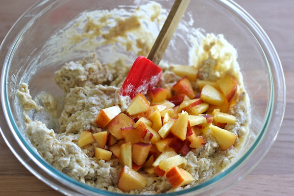 Peach Oatmeal Muffins - Wonderfully light and healthy, these cinnamon sugar crusted muffins are the perfect start to your mornings!