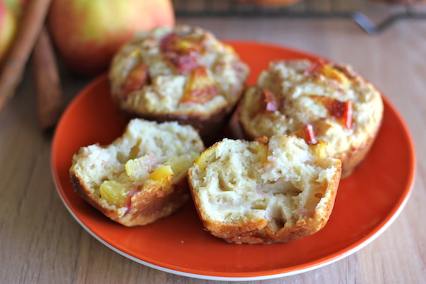 Peach Oatmeal Muffins - Wonderfully light and healthy, these cinnamon sugar crusted muffins are the perfect start to your mornings!