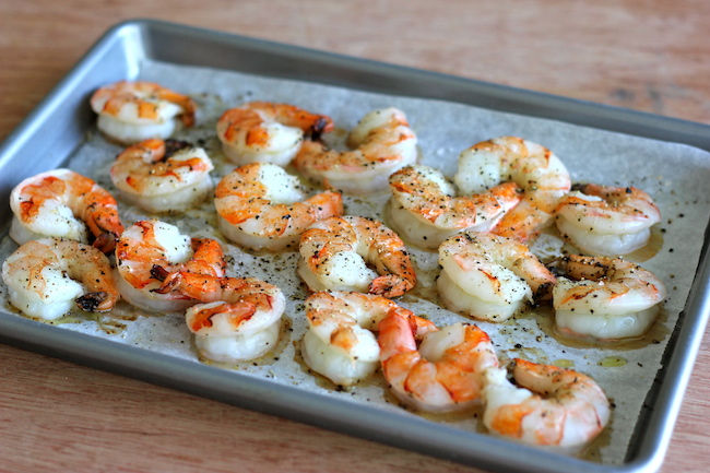 Roasted Shrimp Enchiladas with JalapeƱo Cream Sauce - Smothered in a rich, jalapeƱo cream sauce, how can you resist?!