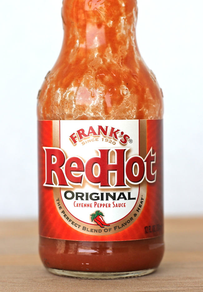 Buffalo Chicken Cups - Crisp oven-baked wonton cups loaded with buffalo chicken and blue cheese!