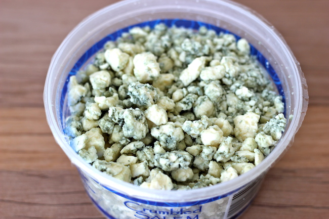 Buffalo Chicken Cups - Crisp oven-baked wonton cups loaded with buffalo chicken and blue cheese!