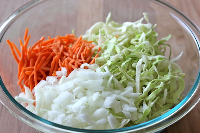Oven-Fried Chicken with Homemade Coleslaw - These chicken thighs are so crisp, no one will believe you when you tell them it's been baked!