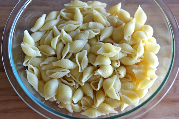 Pesto Pasta with Sun Dried Tomatoes and Roasted Asparagus - A quick and easy dish for those busy weeknights, and it is chockfull of veggies!