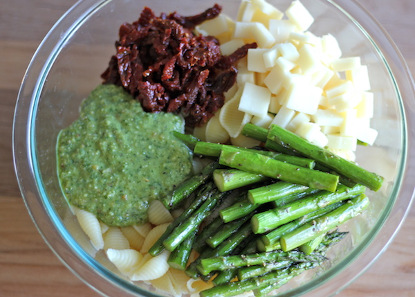 Pesto Pasta with Sun Dried Tomatoes and Roasted Asparagus - A quick and easy dish for those busy weeknights, and it is chockfull of veggies!