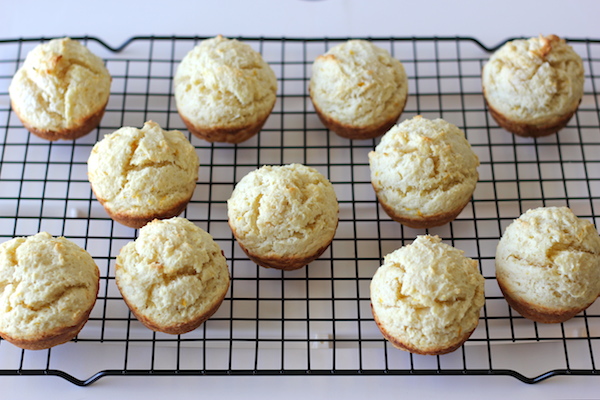 Orange Sour Cream Muffins with Zesty Orange Glaze - Start your mornings off right with these refreshing muffins with a decadent glaze!