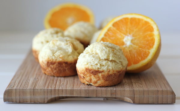 Orange Sour Cream Muffins with Zesty Orange Glaze - Start your mornings off right with these refreshing muffins with a decadent glaze!