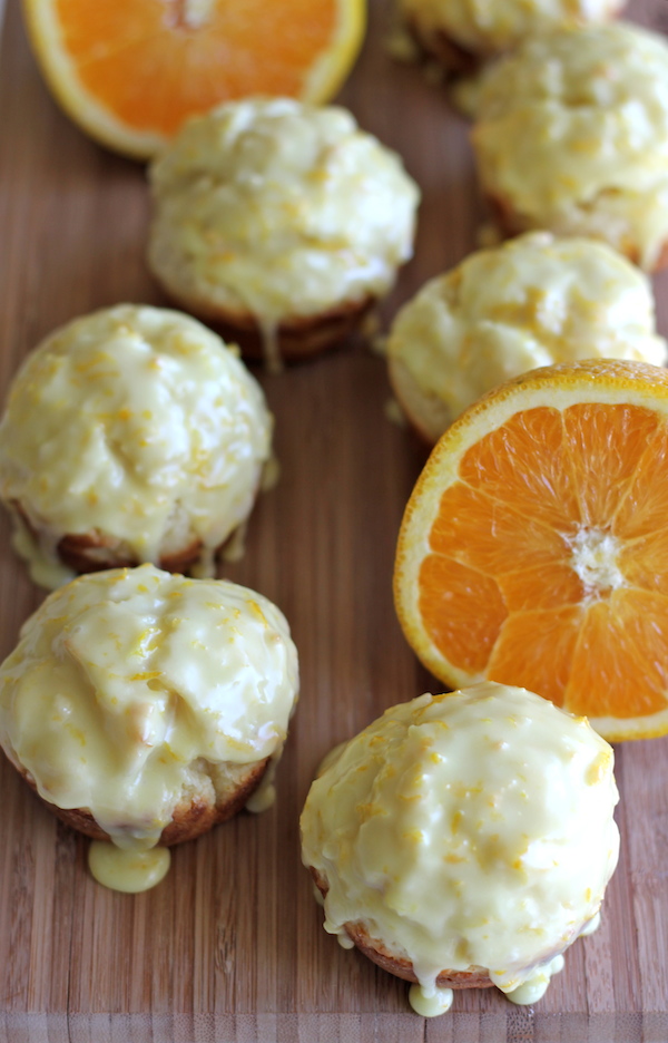 Orange Sour Cream Muffins with Zesty Orange Glaze - Start your mornings off right with these refreshing muffins with a decadent glaze!