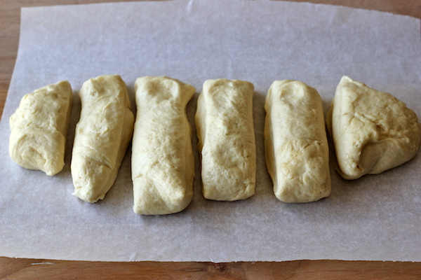 Monkey Bread Cupcakes - Classic monkey bread in irresistible cupcake form oozing with cinnamon sugar goodness and a dripping vanilla glaze!