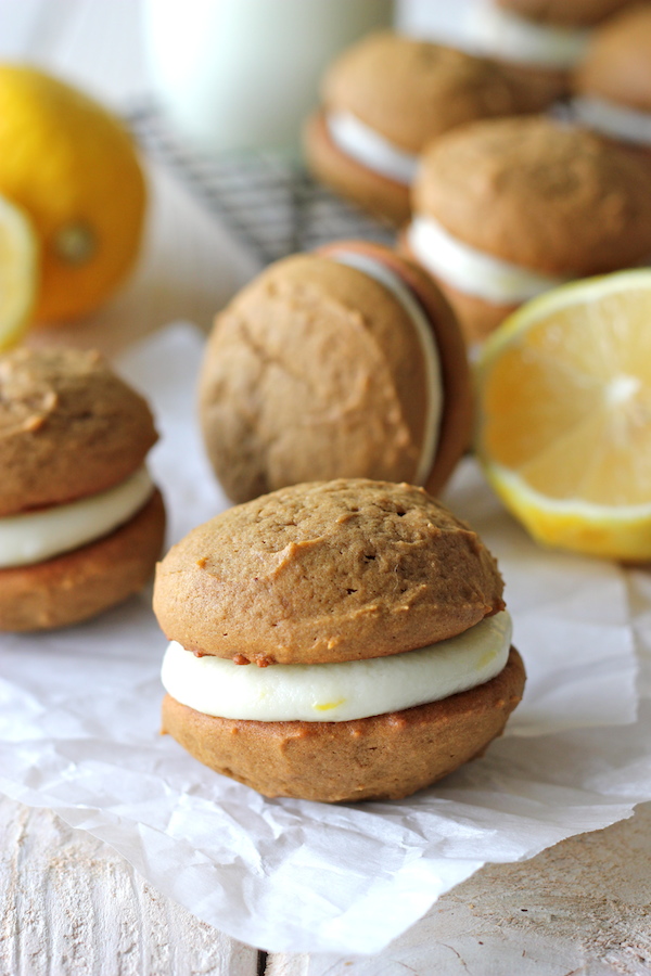Gingerbread Whoopie Pies - The classic gingerbread cookie is reinvented with the most luscious, most decadent lemon cream cheese filling!