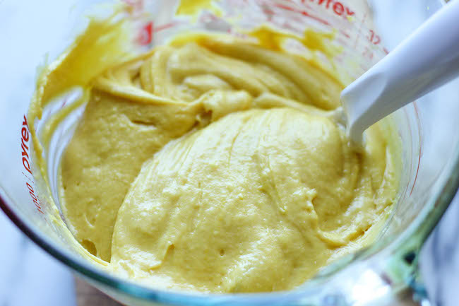 Candy Corn Cupcakes - These simple vanilla cupcakes can easily be dressed up to resemble the layers of candy corn goodness!