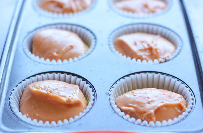 Candy Corn Cupcakes - These simple vanilla cupcakes can easily be dressed up to resemble the layers of candy corn goodness!
