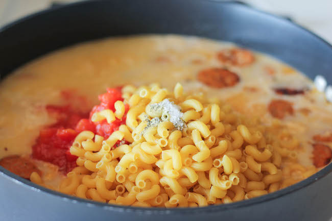 One Pot Andouille Sausage Skillet Pasta - This dish comes together so easily in one skillet. Even the pasta gets cooked right in the pan!