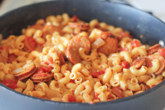 One Pot Andouille Sausage Skillet Pasta - This dish comes together so easily in one skillet. Even the pasta gets cooked right in the pan!