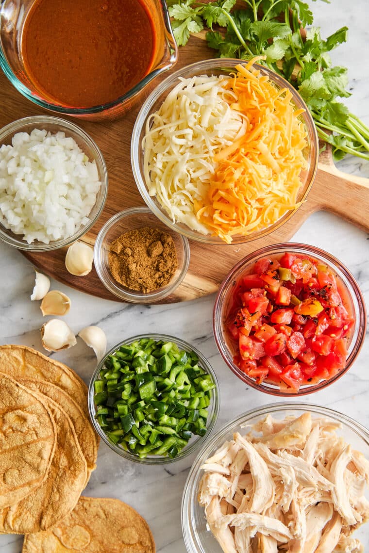 Chicken Enchilada Skillet - A quick, easy one pot dinner to feed a crowd! No rolling, no folding! Serve with your favorite toppings. SO GOOD!