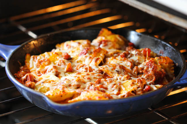 Ravioli and Italian Sausage Skillet - Cheesy comfort food at its best made in less than 30 min. You can't beat that!