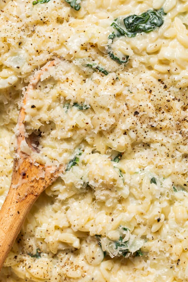 Parmesan and Spinach Orzo - This creamy, velvety orzo side dish is quick and easy + will go with any main dish! An absolute family-favorite.