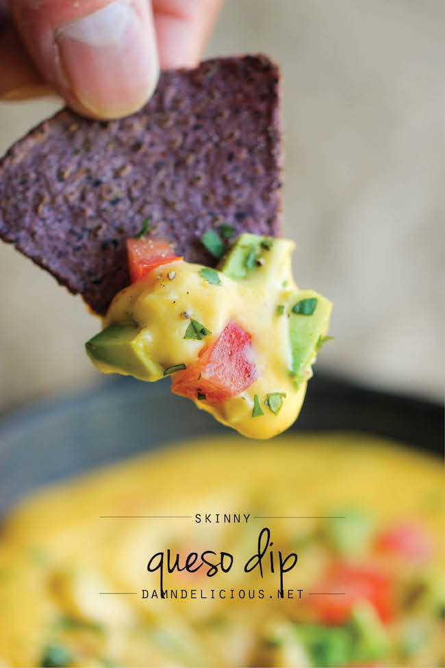 Skinny Queso Dip - An amazingly cheesy and creamy dip that you can enjoy guilt-free. It's so good, you'll want to eat this with a spoon!