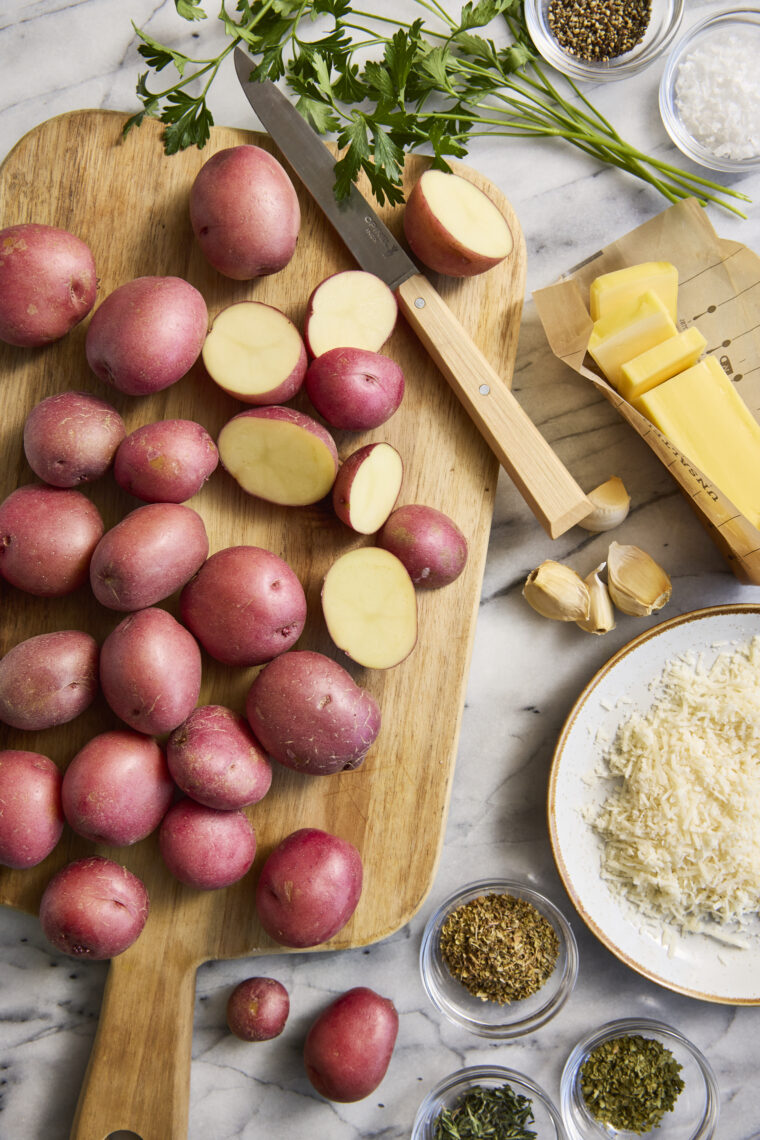 Garlic Parmesan Roasted Potatoes - Perfectly crisp-tender garlicky, buttery roasted potatoes. The most perfect side dish for all your meals!