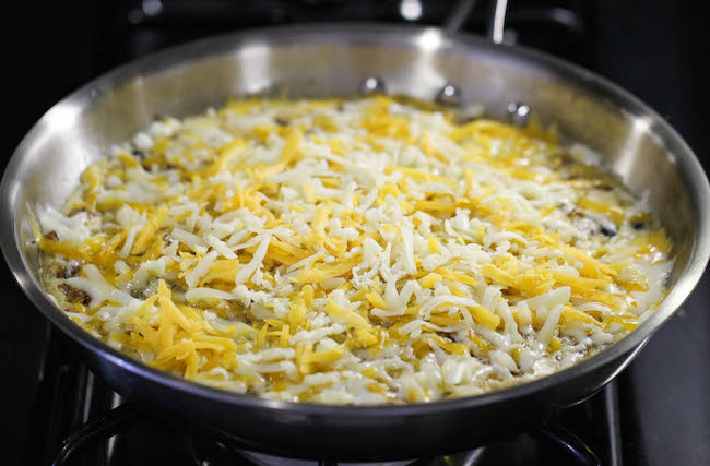 Easy Taco Pie - The easiest, cheesiest pie you will ever make in a single skillet in just 30 min - perfect for those busy weeknights and picky eaters!