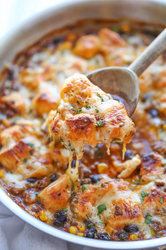 One Pan Enchilada Bake - The easiest and cheesiest enchilada bake made in a single pan - easy peasy with only one dirty pot. You can't beat that!