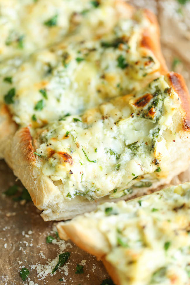Spinach and Artichoke Dip French Bread - The classic spinach and artichoke dip is upgraded into the cheesiest, crustiest French bread ever!
