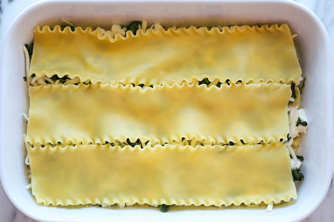 Creamy Spinach and Mushroom Lasagna - This is sure to become a family favorite. Best of all, it's freezer-friendly and can also be made ahead of time!