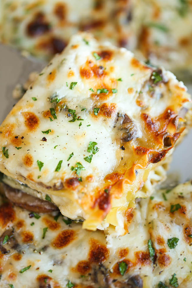 Creamy Spinach and Mushroom Lasagna - This is sure to become a family favorite. Best of all, it's freezer-friendly and can also be made ahead of time!
