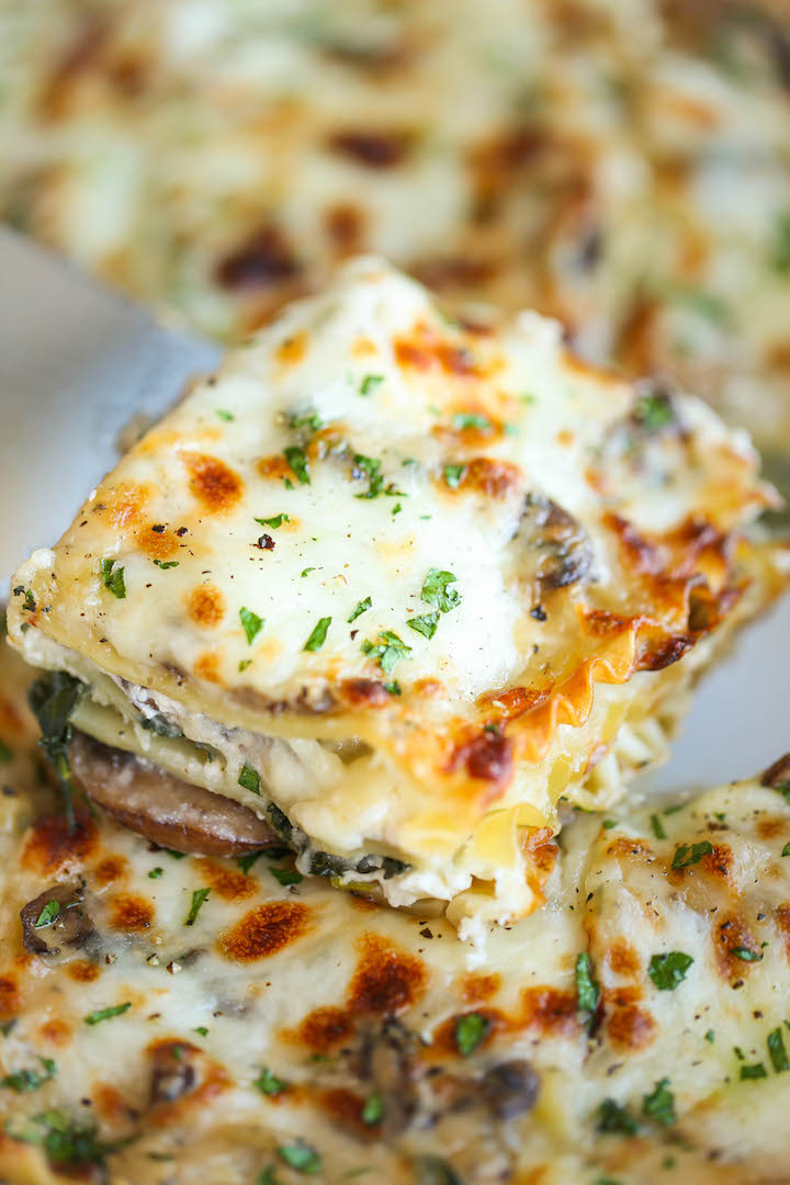 Creamy Spinach and Mushroom Lasagna - This is sure to become a family favorite. Best of all, it's freezer-friendly and can also be made ahead of time!