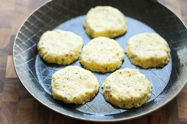 Mini Cauliflower Pizzas - These pizzas are made into easy single-serving portions and are so much healthier with a crisp cauliflower crust! 98.5 calories.