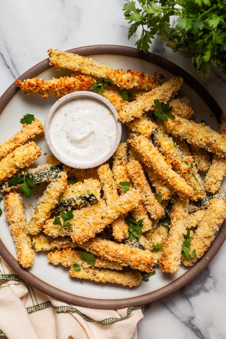 Baked Zucchini Fries - BAKED, super crispy, perfectly golden brown zucchini fries! So easy to make and such a healthier alternative to fries and chips. Yes, please!