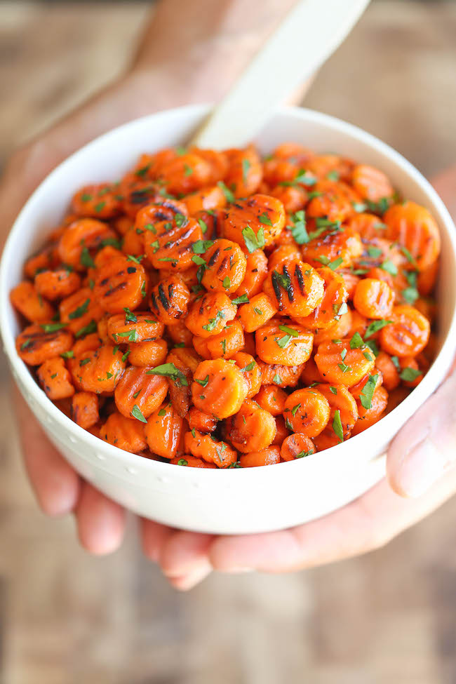 Honey Maple Roasted Carrots - An easy simple side dish to accompany any meal, tossed in olive oil, maple syrup, honey and herbs. Just 5 min prep. That's it!