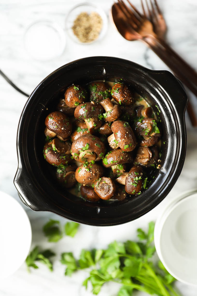 Slow Cooker Garlic Herb Mushrooms - The best and EASIEST way to make mushrooms. In a crockpot with garlic, herbs and butter! Just 5 min prep.