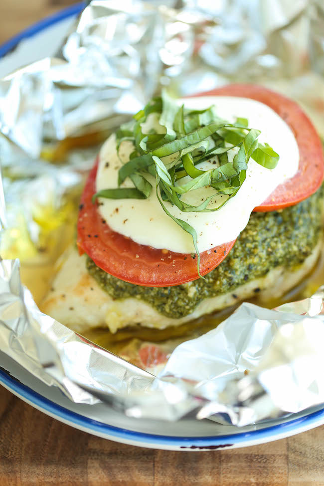 Pesto Caprese Chicken in Foil - Dinner has never been easier with these foil packets - simple wrap and bake. SO EASY! And the leftovers taste even better!