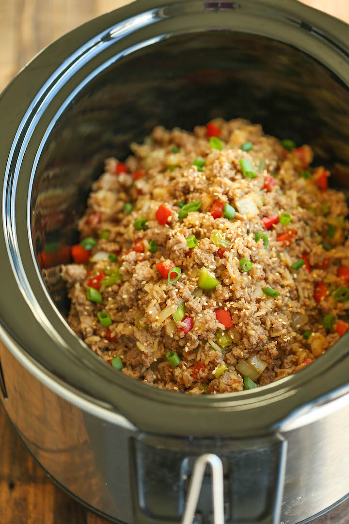 Slow Cooker Teriyaki Chicken and Rice - Saucy chicken, rice and veggies come together so easily right in the crockpot. Sure to be a weeknight staple!