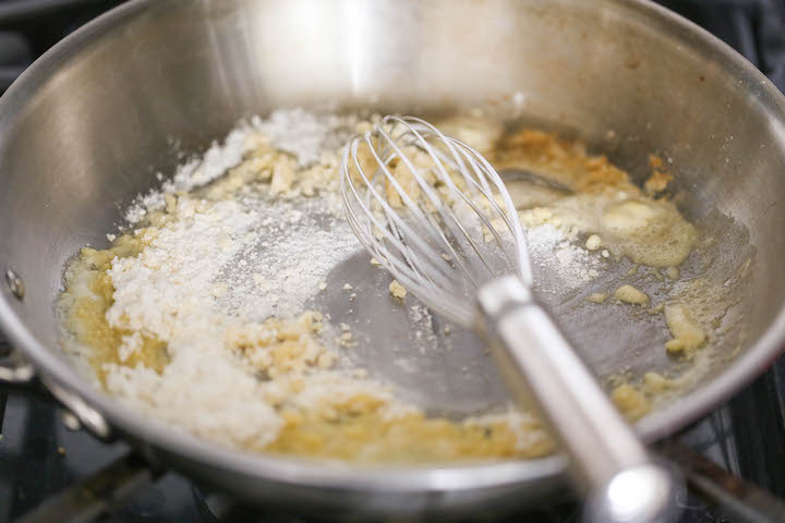 10 Minute Nacho Cheese - Super easy and completely made from scratch (no Velveeta)! It's cheesy, sharp, smoky, unbelievably velvety and just SO GOOD!