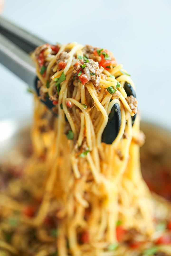 One Pot Taco Spaghetti - All your favorite flavors of tacos in spaghetti form - made in ONE PAN!  So cheesy, comforting and stinking easy with no clean-up!