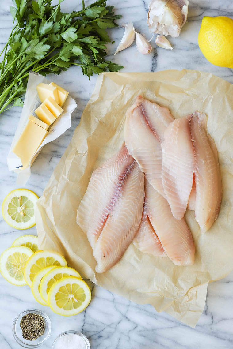 Baked Lemon Butter Tilapia - The easiest, most effortless 20 min meal ever from start to finish. And it's all made in a single pan. Win-win situation here.