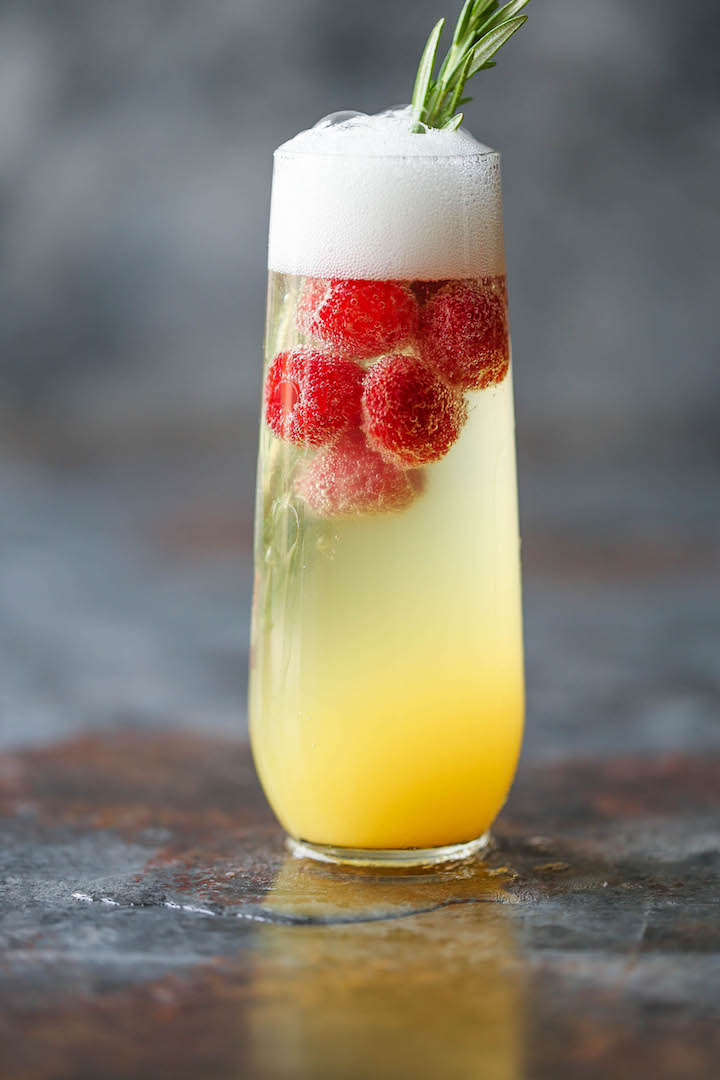 Champagne Punch - A festive cocktail for any occasion that's sure to impress! Unbelievably easy, fruity and refreshing! Can be made non-alcoholic as well.