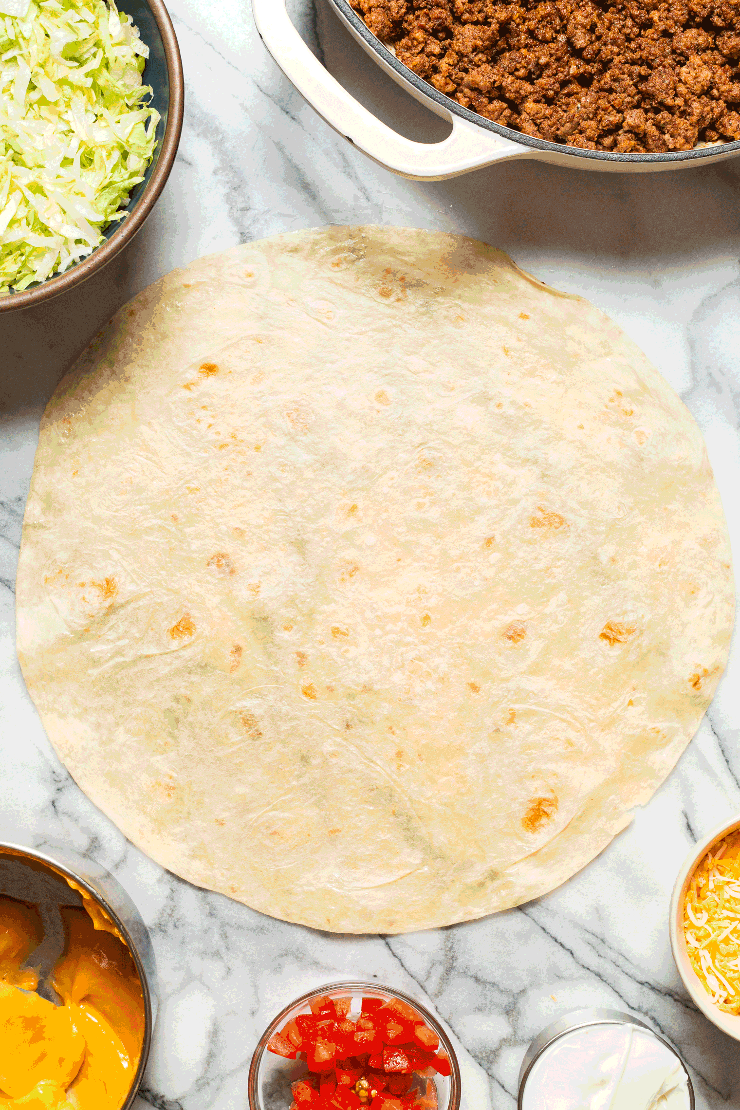 Homemade Crunch Wrap Supreme - A complete DIY Taco Bell copycat version completely homemade, made so much healthier and tastier (and so customizable). So easy, so so good!