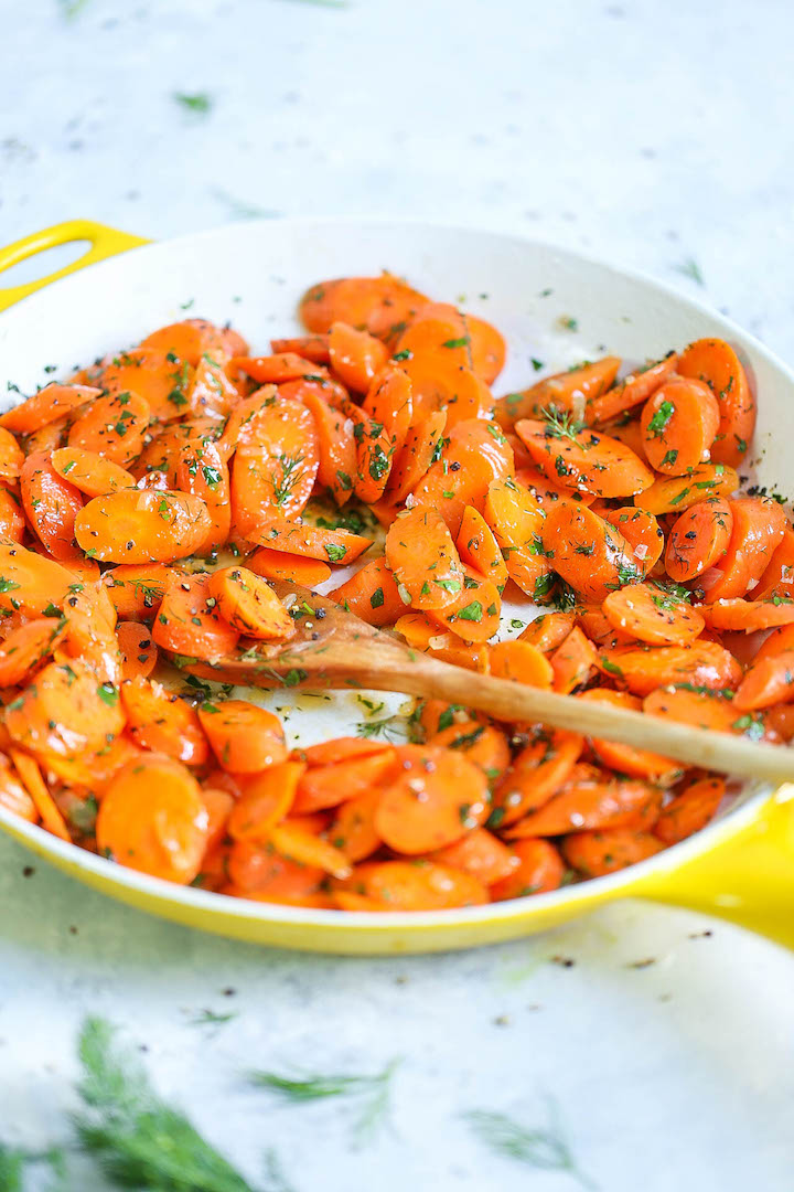 Garlic Herb Carrots - This quick and easy side dish comes out perfectly every single time. The carrots come out amazingly garlicky, buttery and slightly sweet, tossed with fresh dill, parsley and tarragon. It is so simple yet it is elegant enough for any occasion!
