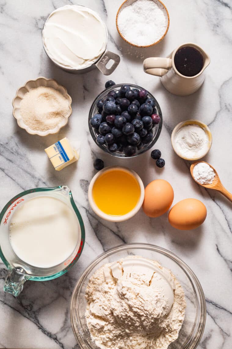 Blueberry Sour Cream Pancakes - Light, fluffy, melt-in-your-mouth buttery pancakes with juicy blueberries. Restaurant-quality right at home!