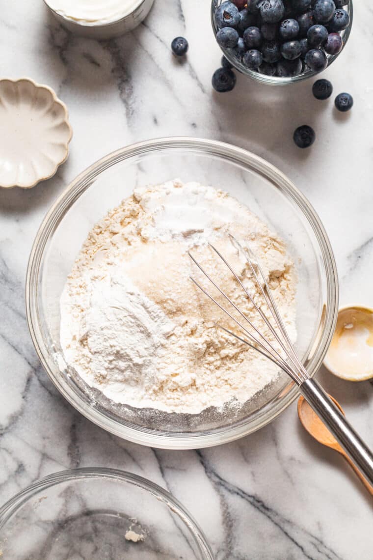 Blueberry Sour Cream Pancakes - Light, fluffy, melt-in-your-mouth buttery pancakes with juicy blueberries. Restaurant-quality right at home!