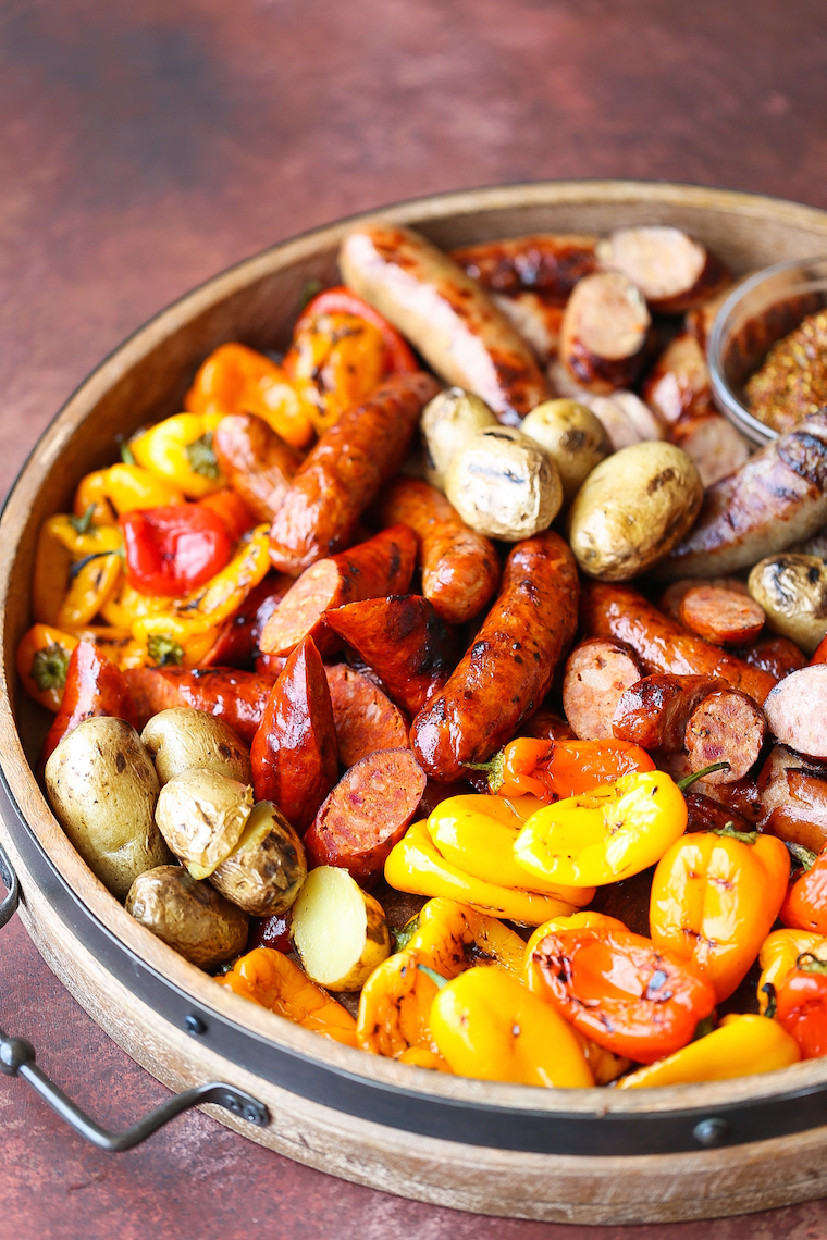 Grilled Sausages, Peppers and Potatoes - The most amazing grilled sausage platter for your next potluck or BBQ! This is easy to prepare and so impressive!