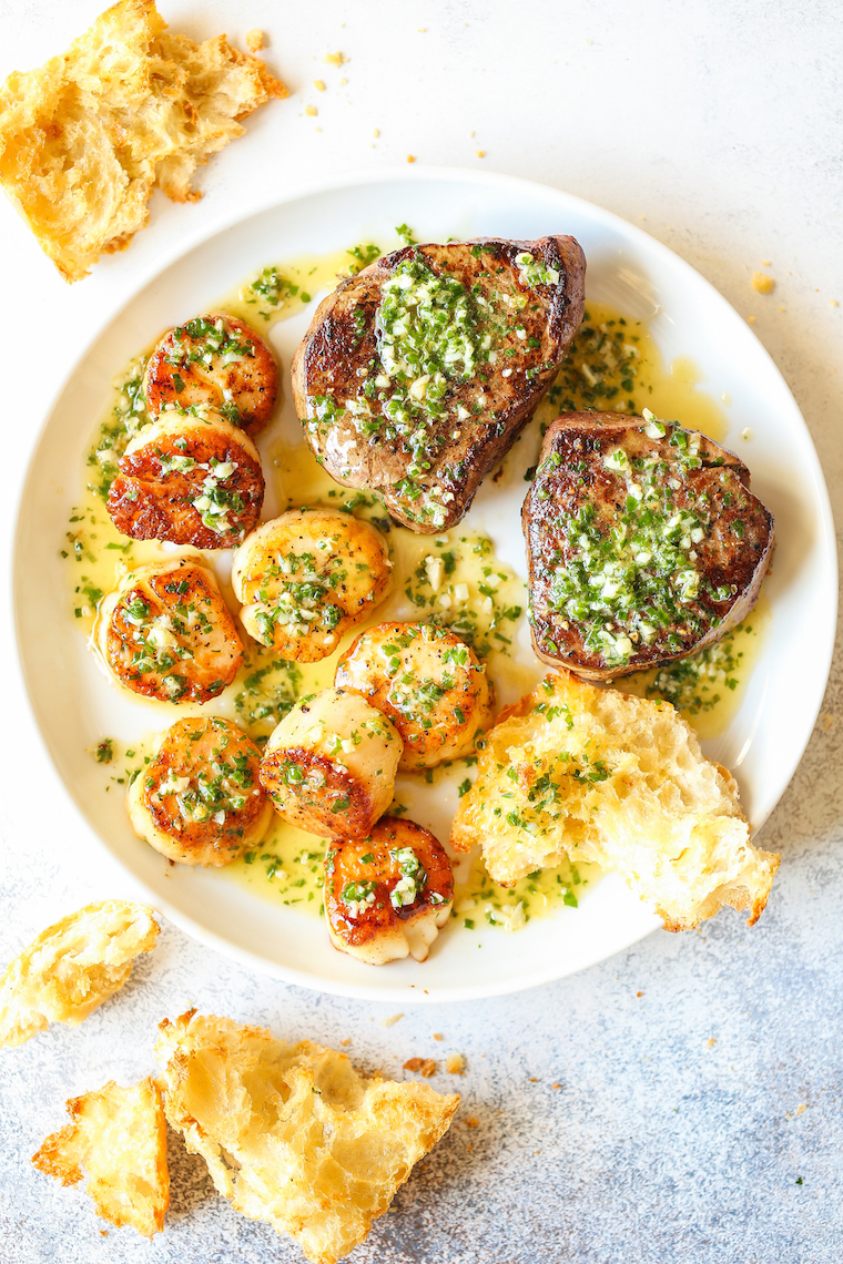 Garlic Butter Steak and Scallops - SURF AND TURF made in less than 30 minute! The steak and scallops are perfectly cooked with the dreamiest garlic butter sauce. Yes, please!