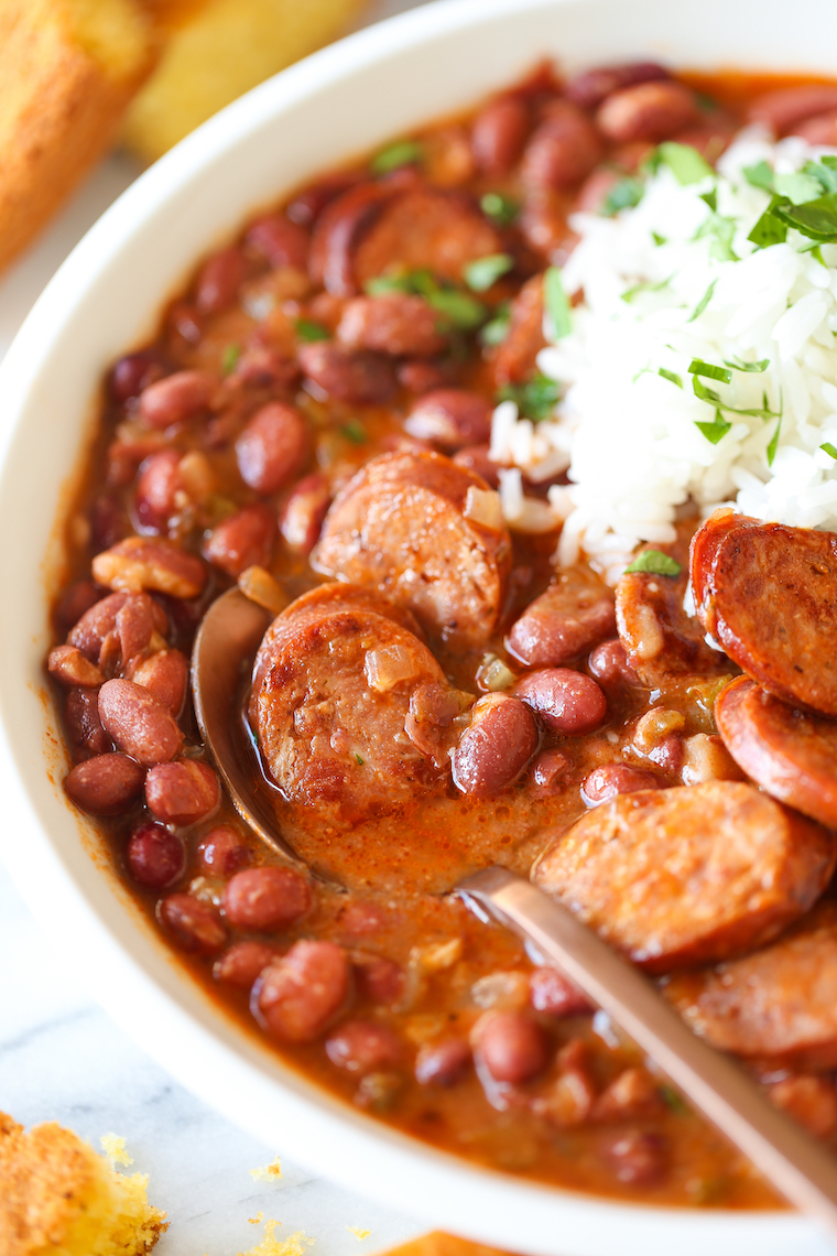 Red Beans and Rice - So thick, creamy, flavorful! Beans are cooked just right. Perfectly tender served with rice and smoky andouille sausage!
