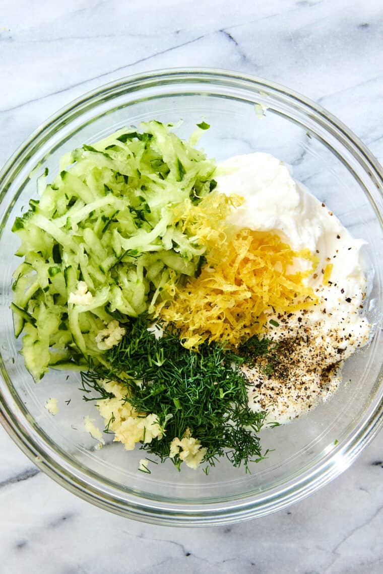 Homemade tzatziki sauce ingredients in bowl