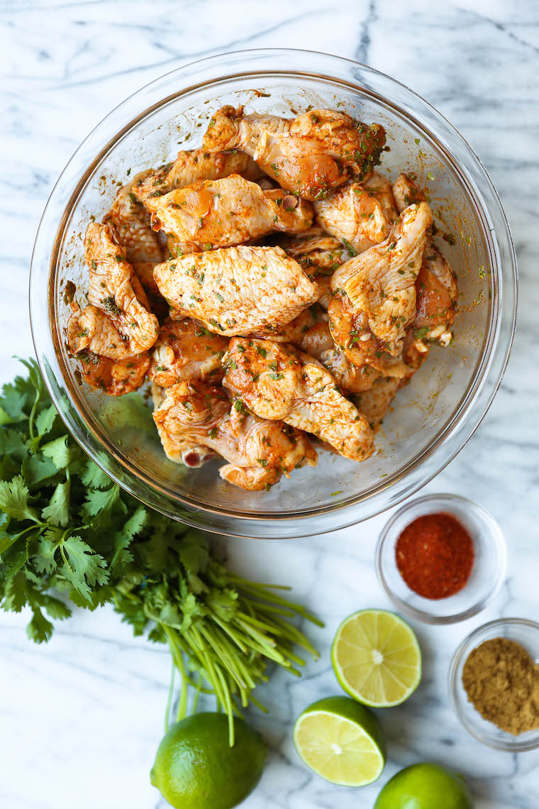 Cilantro Lime Chicken Wings - Oh-so-perfectly crispy, charred + smoky with the easiest marinade. Cilantro, lime, cumin, chili powder. So good.