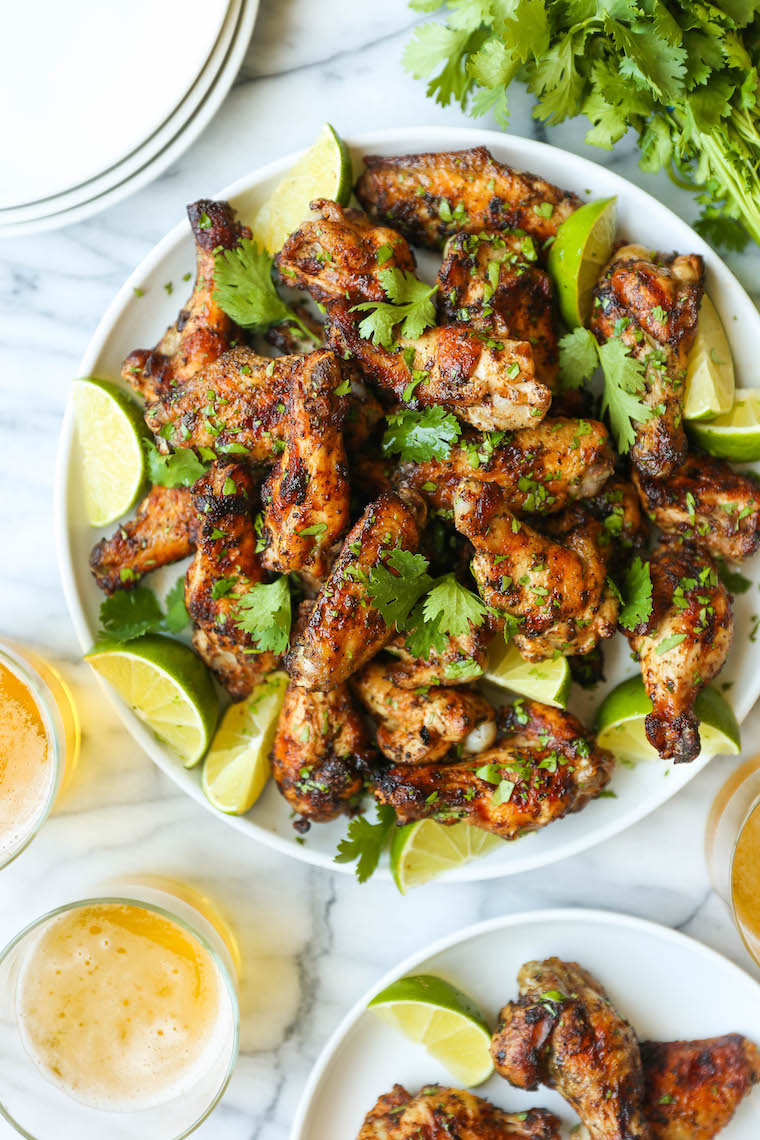 Cilantro Lime Chicken Wings - Oh-so-perfectly crispy, charred + smoky with the easiest marinade. Cilantro, lime, cumin, chili powder. So good.