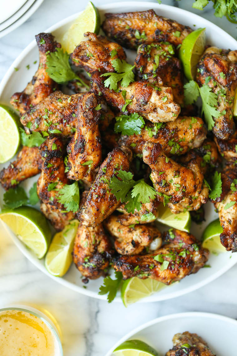 Cilantro Lime Chicken Wings - Oh-so-perfectly crispy, charred + smoky with the easiest marinade. Cilantro, lime, cumin, chili powder. So good.